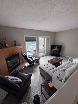 Smart TV, fireplace, foosball