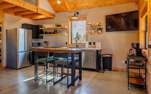 Coffee/tea maker, fridge, microwave, oven