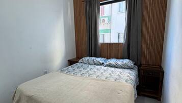 Apartamento | Wi-Fi de cortesia, roupa de cama