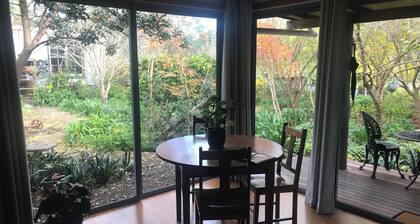 The Bale. Cosy cabin set amongst lush gardens in the Hunter Valley.