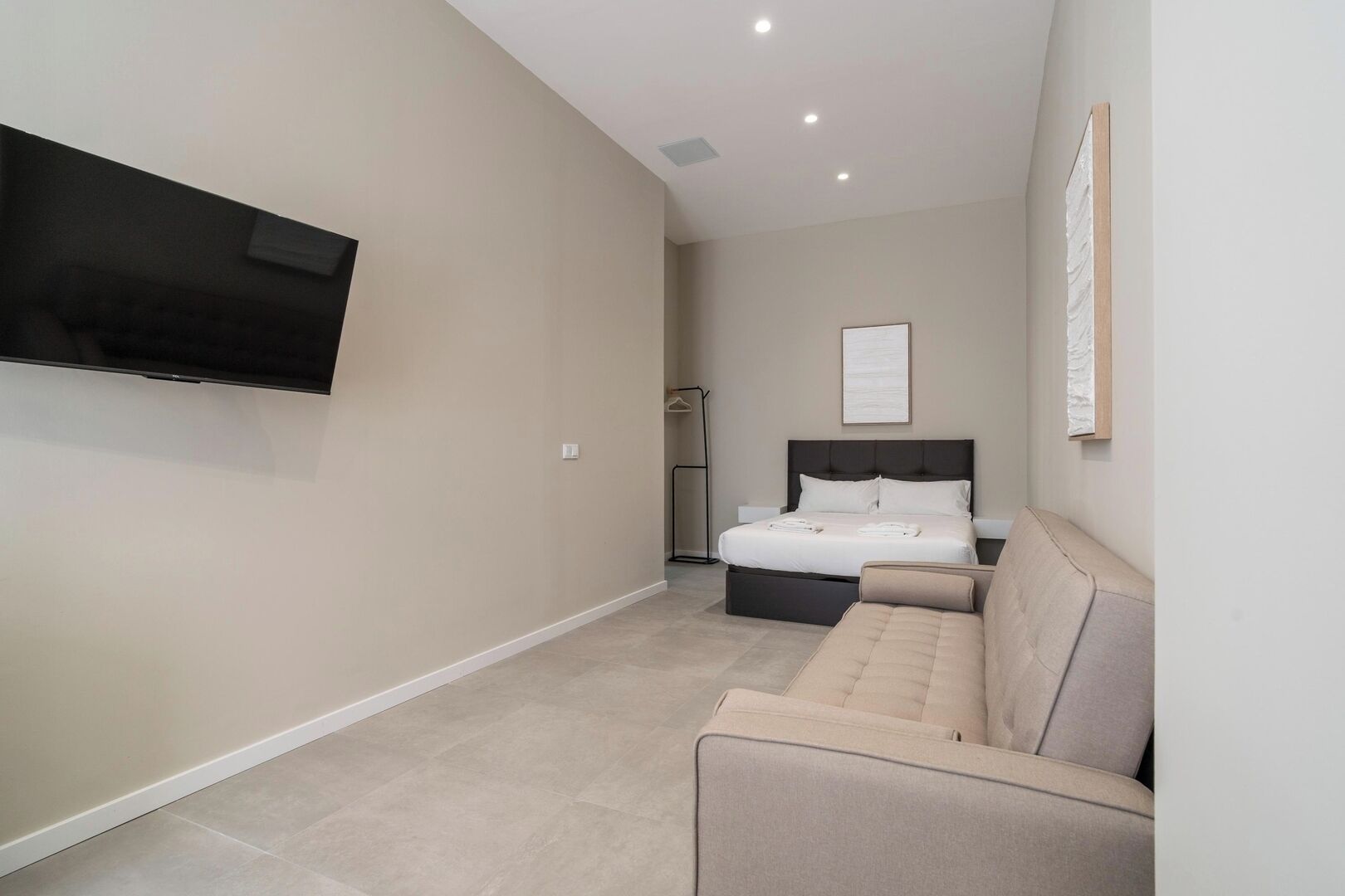 Iron/ironing board, travel crib, free WiFi, bed sheets