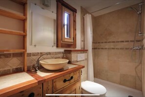 Shower, hair dryer, towels, toilet paper