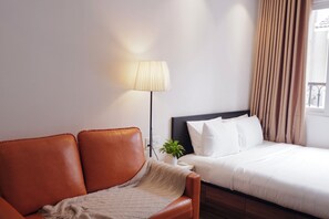Estudio Confort, vistas a la ciudad | Cortinas opacas, tabla de planchar con plancha, wifi gratis