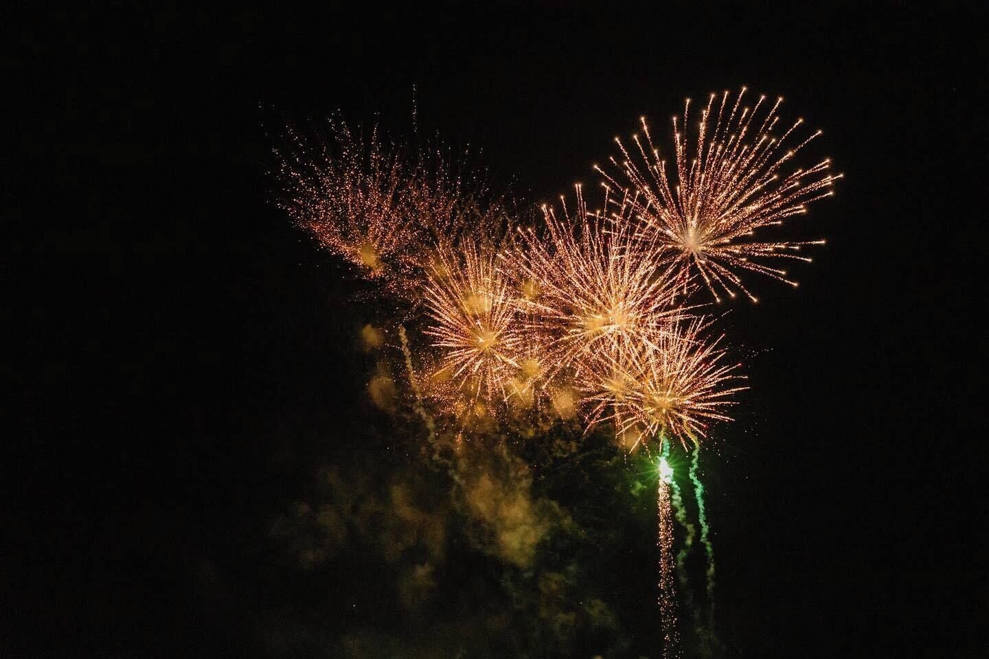 A night sky with fireworks.