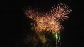 A night sky with fireworks.