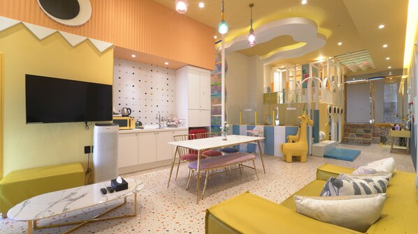 Kids Yellow Room | Living area | 40-inch TV with cable channels, heated floors