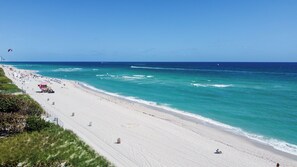 On the beach, sun-loungers, beach towels