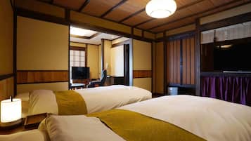 Habitación Deluxe con 2 camas individuales, balcón, vistas al mar | Caja fuerte y wifi gratis