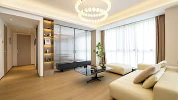 Luxury Apartment, City View | Living area | 120-inch Smart TV with cable channels