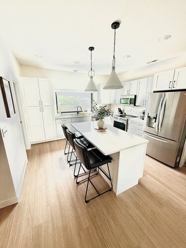 Modern 3-Story Condo Across from Arnold’s Park – Walk to Fun, Lake, & Dining!