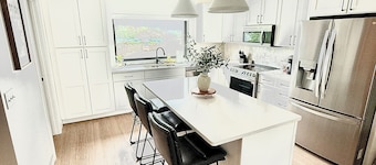 Modern 3-Story Condo Across from Arnold’s Park – Walk to Fun, Lake, & Dining!
