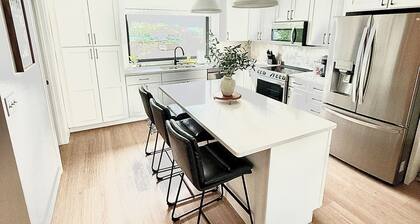 Modern 3-Story Condo Across from Arnold’s Park – Walk to Fun, Lake, & Dining!