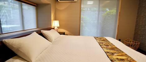 Family Villa, Garden View | Blackout drapes, iron/ironing board, free WiFi