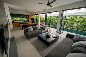 Luxury Villa, 2 Bedrooms, Private Pool | Living area | 40-inch LED TV with cable channels, books - Anwa Bali Boutique Resort (Kerobokan)