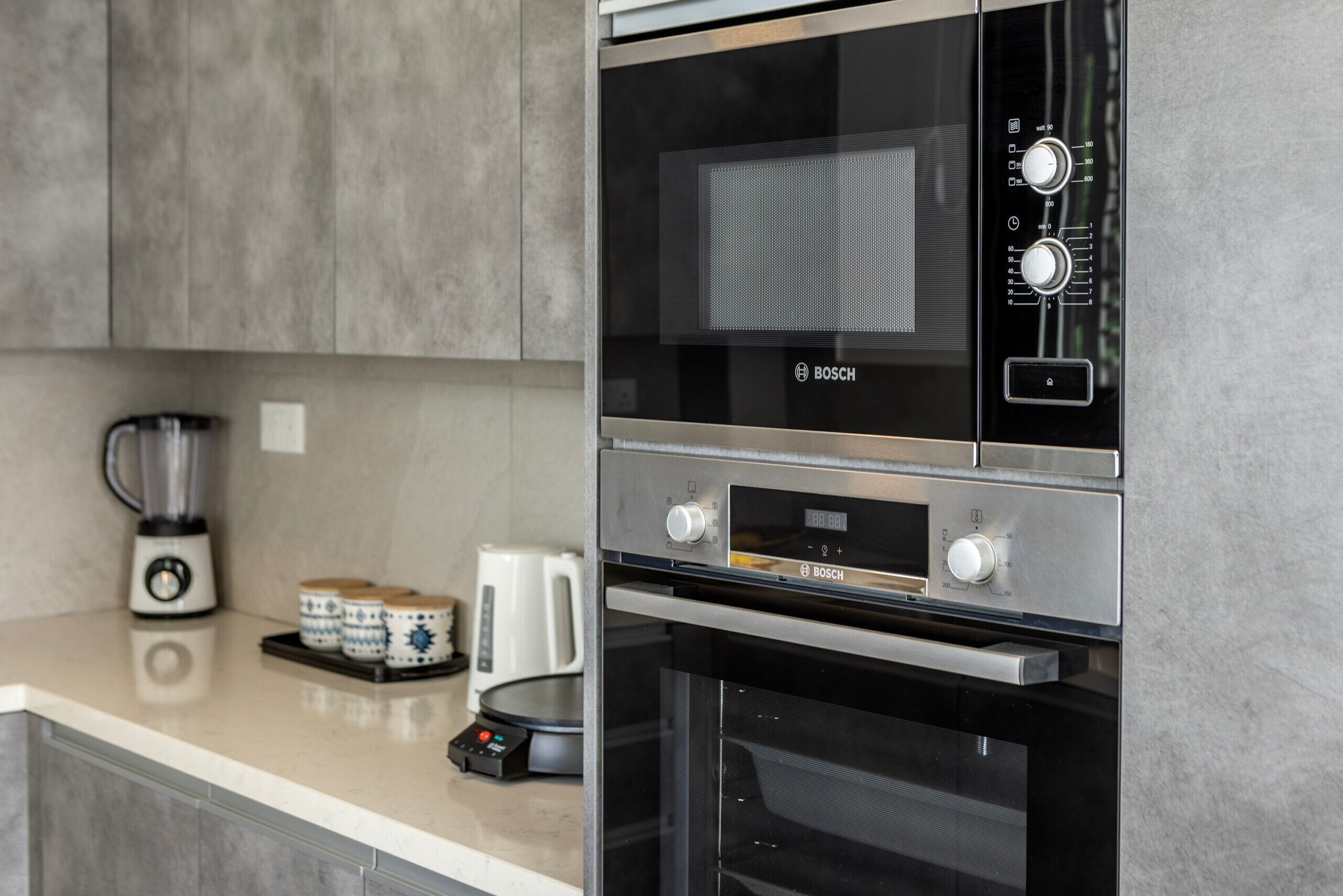Microwave, coffee/tea maker, cookware/dishes/utensils