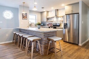 Fridge, microwave, dishwasher, coffee/tea maker