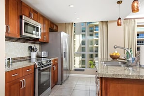 Condo (4 Bedrooms) | Private kitchen | Microwave, oven, dishwasher, coffee/tea maker