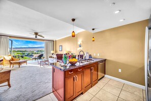 Condo (4 Bedrooms) | Private kitchen | Microwave, oven, dishwasher, coffee/tea maker