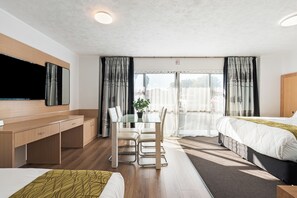 Family Triple Room, Mobility Accessible | Desk, laptop workspace, free WiFi, bed sheets