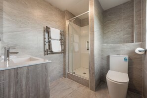 Family Triple Room, Balcony | Bathroom | Shower, hair dryer, towels, soap