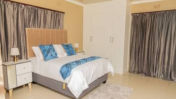 Economy Double Room, Garden View | Desk, iron/ironing board, free WiFi