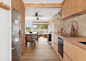 Fridge, stovetop, dishwasher, coffee/tea maker
