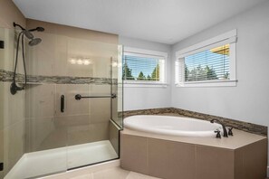 Shower, hair dryer, towels, shampoo