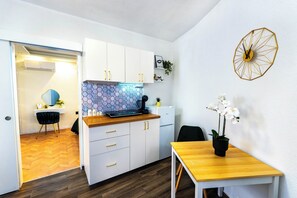 Comfort Apartment | Private kitchen | Coffee/tea maker, electric kettle, eco-friendly cleaning products