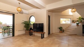 Superior Villa, Sea View | Living area | Flat-screen TV