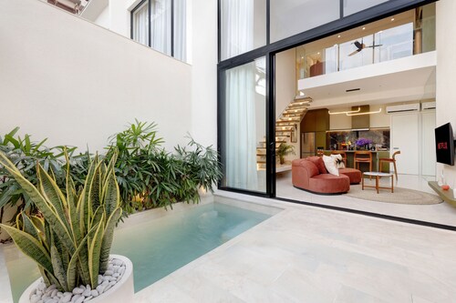 The Oasis III Townhouses By Breig