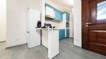 Casa, varanda, vista para o jardim | Cozinha privada | Cadeirão de bebê