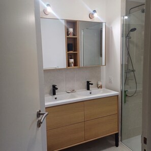 Shower, hair dryer, towels, soap