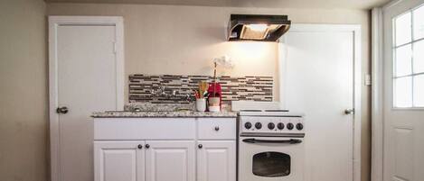 Oven, stovetop, coffee/tea maker, cookware/dishes/utensils