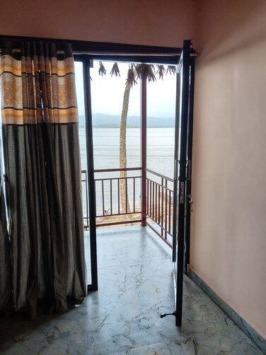 This is river front farm stay 
Morning sunrise is seen inside of the rooms