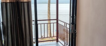 This is river front farm stay 
Morning sunrise is seen inside of the rooms