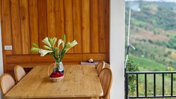 Deluxe Double Room, Hill View | Living area | 32-inch flat-screen TV with cable channels