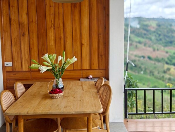 Deluxe Double Room, Hill View | Living area | 32-inch flat-screen TV with cable channels