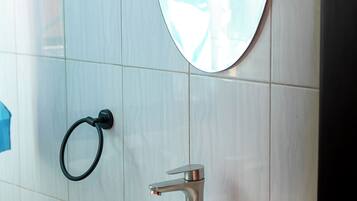 Shower, bidet, towels, soap