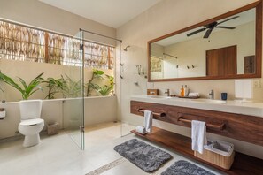 Shower, hair dryer, towels