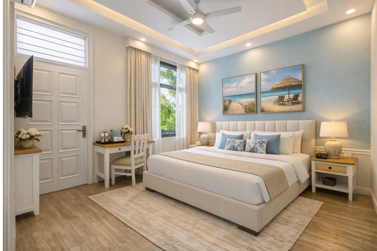 A bedroom with a bed, bedside tables, a desk, a chair, and a window with curtains.