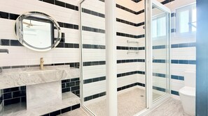 Shower, hair dryer, towels, soap