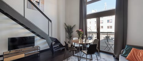 Standard Apartment, Courtyard View | Living area | 36-inch TV with satellite channels