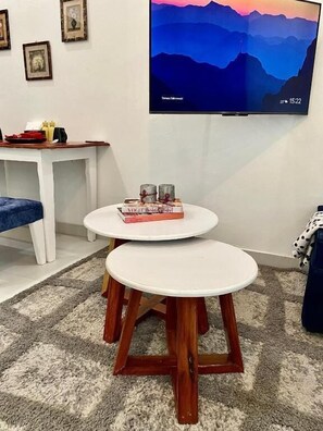 Deluxe Apartment, Garden View | Living area | 24-inch Smart TV with digital channels - Lux Suites Kiamboni Apartments (Nakuru)