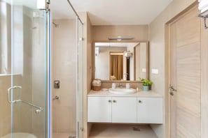 Shower, towels, soap, toilet paper