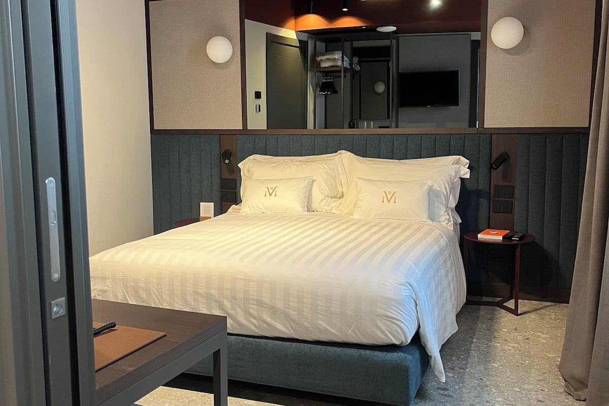 Classic Double Room | Minibar, in-room safe, desk, laptop workspace