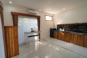 Executive Double Room | Private kitchen | Fridge, electric kettle