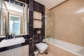 Hair dryer, bidet, towels, soap