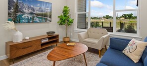 Townhome, Multiple Beds, Patio, Garden View (926 Schlagel St. (unit 2)) | Living area | 65-inch flat-screen TV with digital channels