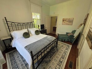 1 bedroom, desk, iron/ironing board, travel crib