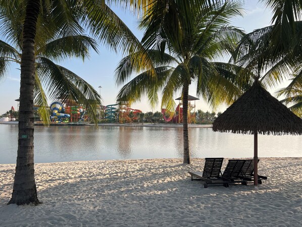 On the beach, white sand, free beach shuttle, sun-loungers